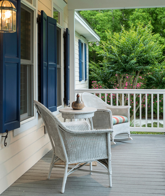 Cozy front porch with two deck chairs