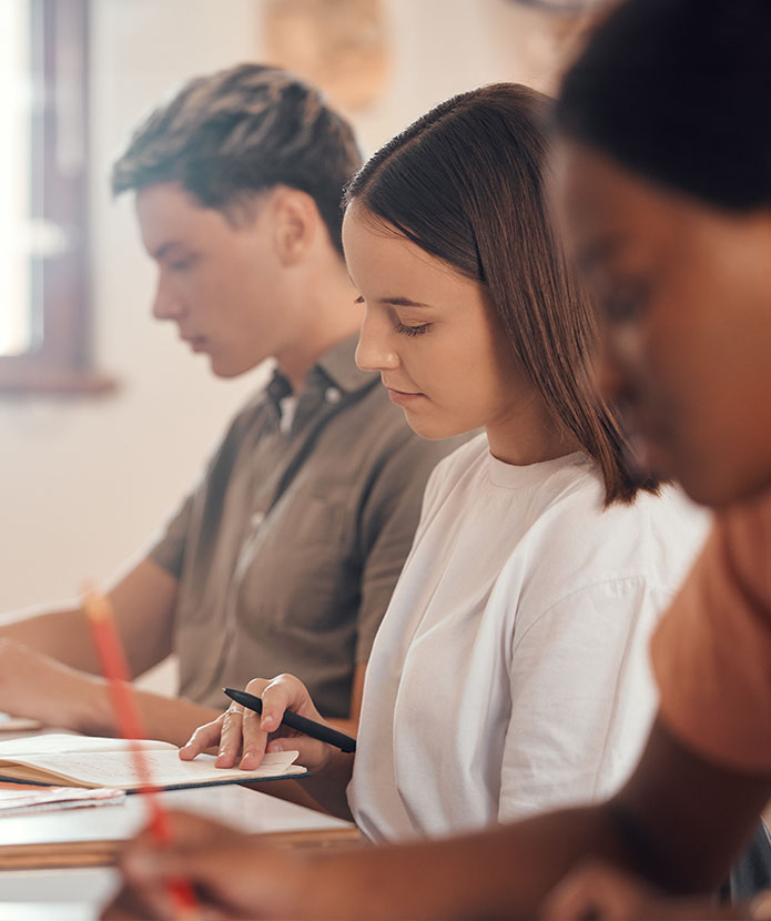 Students in a classroom taking a test