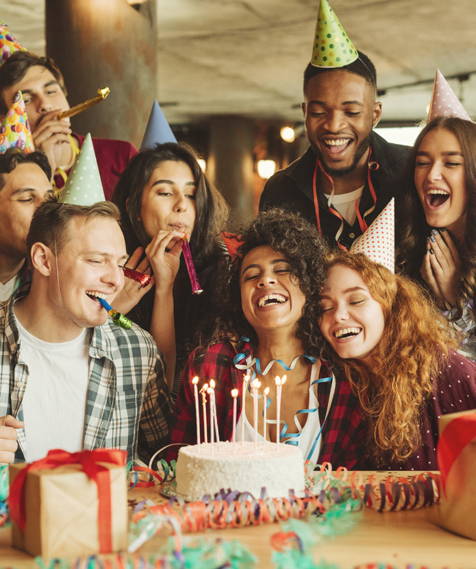 Group of people gathered for a birthday party